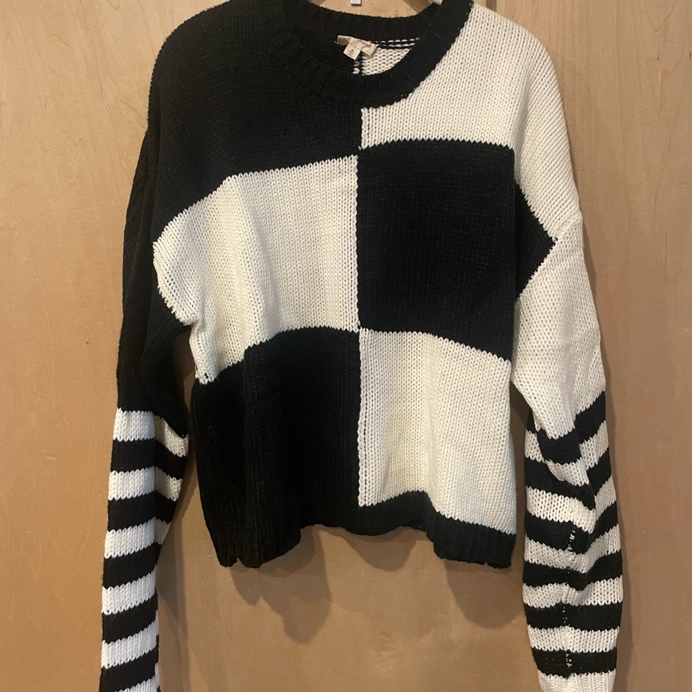 Black and white checkered striped sweater